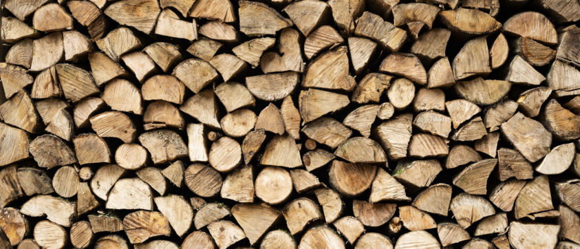 Stacked,Firewood,Pile,Air,Dried,And,Awaiting,Winter,Season.,Oak,