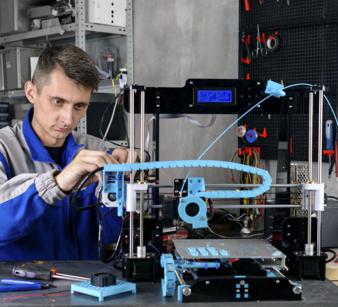 Young,Designer,Engineer,Using,A,3d,Printer,In,Laboratory